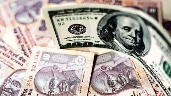 Rupee slides to record low, near 77 per US dollar - livemint.com - Usa - India