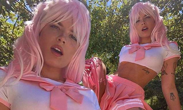 Halsey goes braless and serves up underboob in pink Manga-inspired Instagram snap - dailymail.co.uk