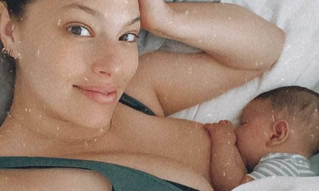 Ashley Graham - Justin Ervin - Ashley Graham shares another breastfeeding snap showing her suckling 13-week-old son Isaac in bed - dailymail.co.uk - state Nebraska - county Story - Lincoln, state Nebraska