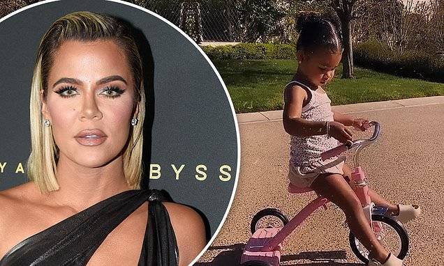Khloe Kardashian - True Thompson - Khloe Kardashian's daughter True Thompson is the picture of girlhood as she perches on a tricycle - dailymail.co.uk