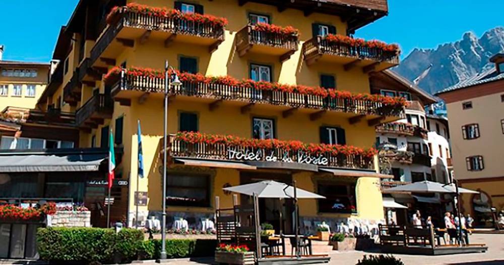 Coronavirus-hit hotel in Italy ski resort sues China for not warning about bug - mirror.co.uk - China - Italy