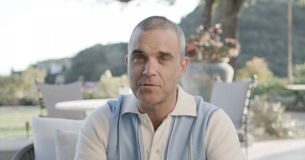Robbie Williams - Robbie Williams tries out 'from the vault' material including a stab at rapping - mirror.co.uk