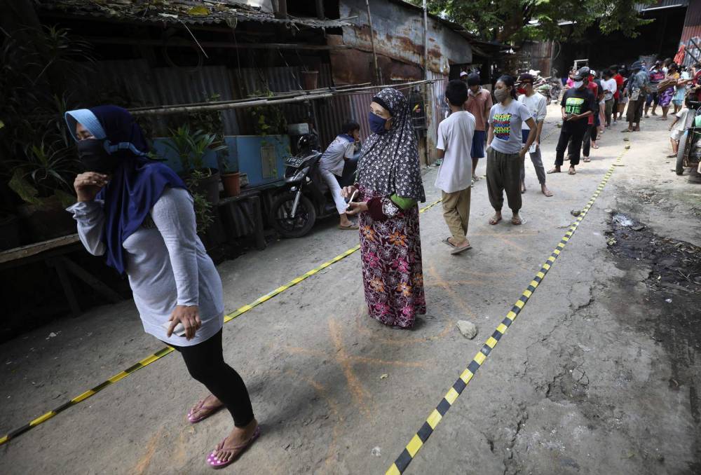 Joko Widodo - Asia Today: Jakarta extends restrictions ahead of Ramadan - clickorlando.com - Indonesia - city Bangkok - city Jakarta