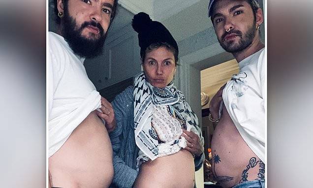 Heidi Klum - Tom Kaulitz - Heidi Klum flashes her bare tummy alongside hubby Tom Kaulitz and twin Bill in Instagram snap - dailymail.co.uk