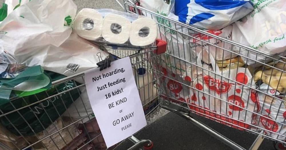Mum-of-16 sticks sign on trolley saying 'not hoarding' after customers shame her - dailystar.co.uk - Australia