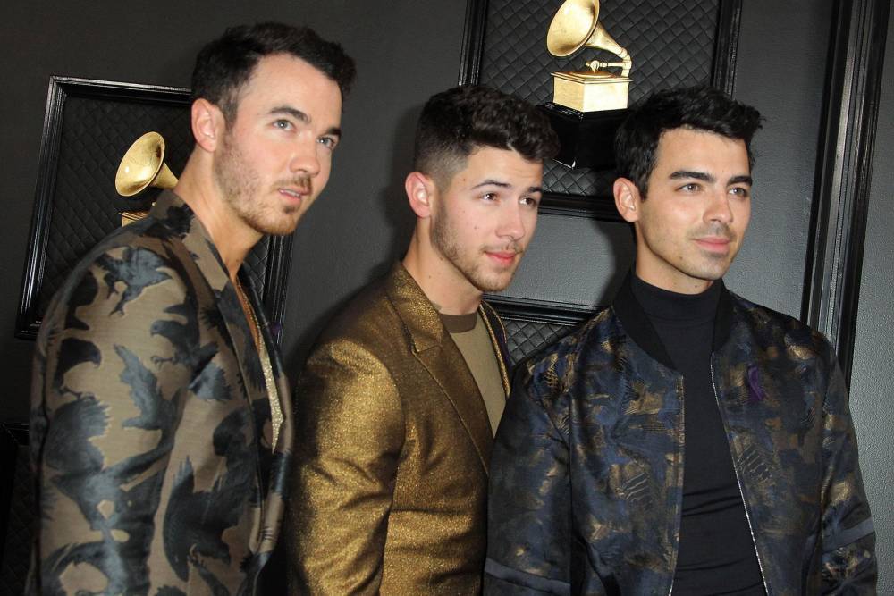 Kevin Jonas - Jonas Brothers tease ‘special announcements’ in Thursday livestream - hollywood.com