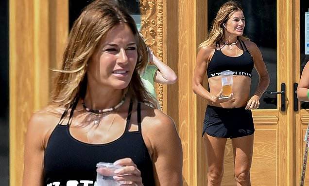 Kelly Bensimon - Kelly Bensimon, 51, flashes her abs as in black sports bra and shorts - dailymail.co.uk - state Florida - county Palm Beach