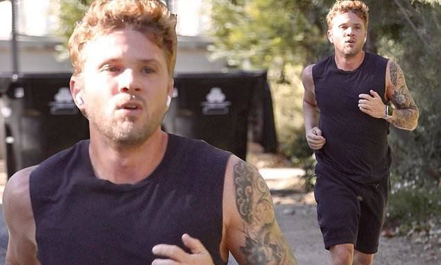Ryan Phillippe - Ryan Phillippe, 45, flaunts his toned biceps in a sleeveless tank top...while out on his daily jog - dailymail.co.uk