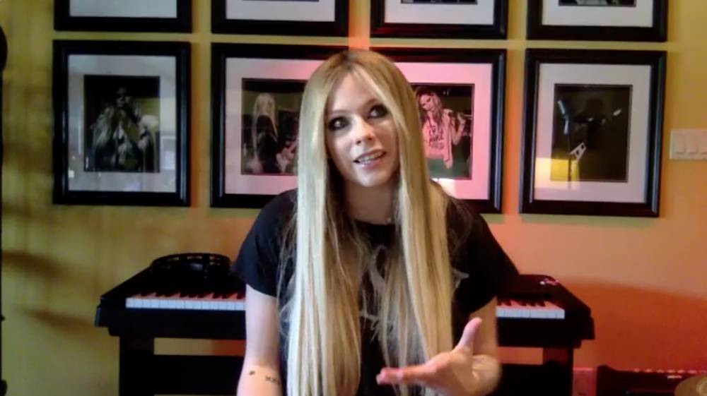 Justin Bieber - Avril Lavigne - Carlos Bustamante - Avril Lavigne Talks ‘We Are Warriors’, Cancelling ‘Head Above Water’ World Tour - etcanada.com - Canada