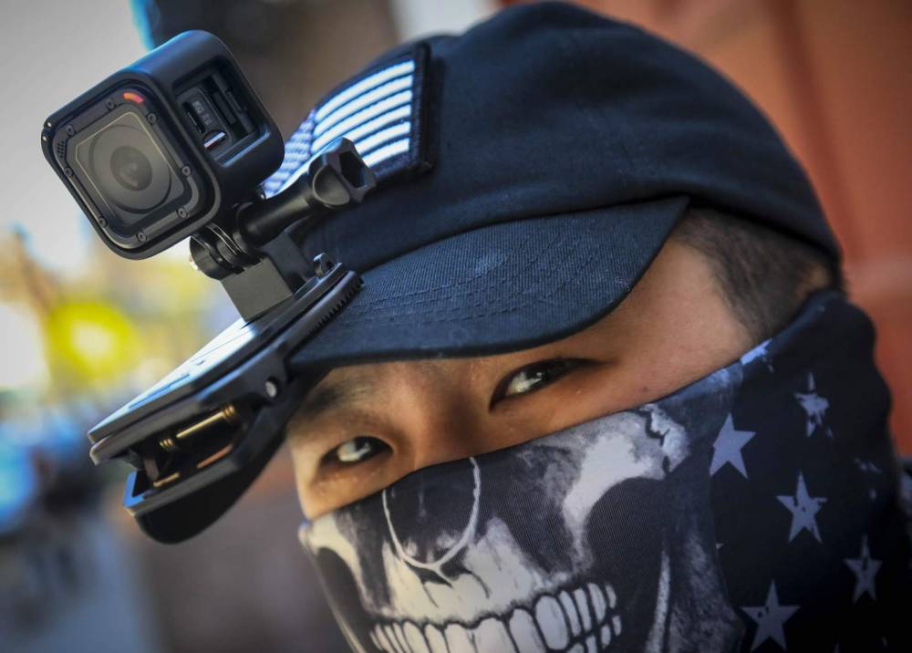 From guns to GoPros, Asian Americans seek to deter attacks - clickorlando.com - China - Usa - North Korea