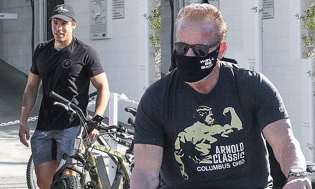 Arnold Schwarzenegger - Joseph Baena - Arnold Schwarzenegger wears Terminator-inspired face mask on bike ride with Joseph Baena - dailymail.co.uk - state California