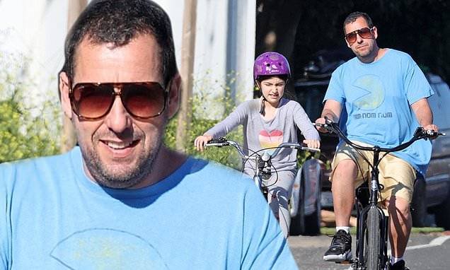 Adam Sandler - Adam Sandler cuts casual look as he takes bike ride with daughter Sunny in Malibu during quarantine - dailymail.co.uk - city Malibu - city Sandler