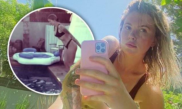 Ireland Baldwin sizzles in a black bikini while taking a dip in her pool during quarantine at home - dailymail.co.uk - Ireland - Los Angeles - county Baldwin