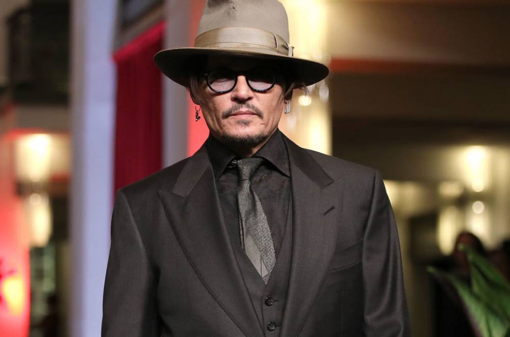 John Lennon - Johnny Depp - Johnny Depp Covers John Lennon's 'Working Class Hero' for Pathway to Paris Benefit - billboard.com