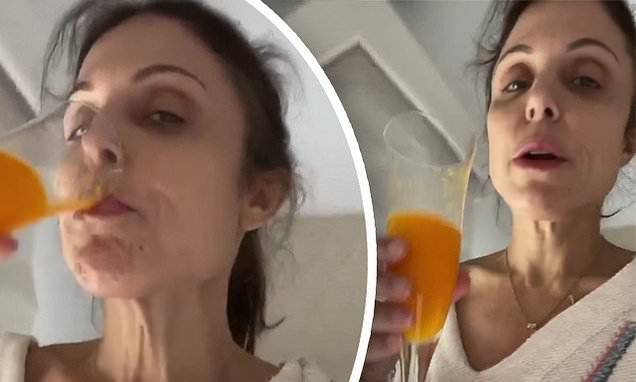 Bethenny Frankel keeps her spirits lifted during lockdown as she enjoys a mimosa during her workout - dailymail.co.uk