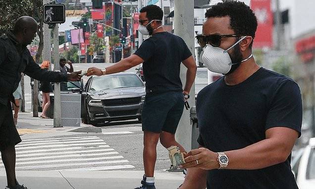 Chrissy Teigen - John Legend gives $10 to homeless man in West Hollywood as he makes ATM stop during quarantine - dailymail.co.uk - Los Angeles