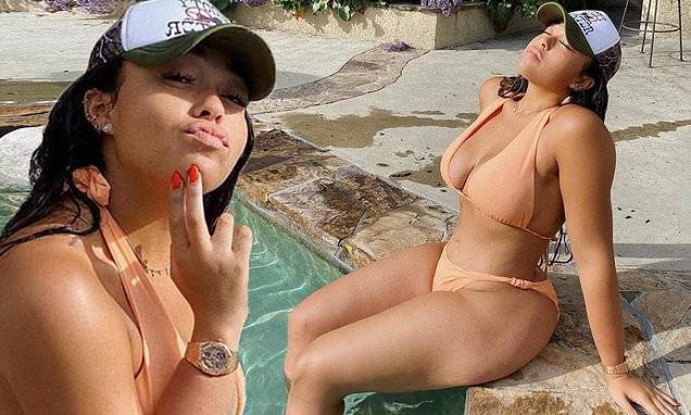 Kylie Jenner - Kylie Jenner's former BFF Jordyn Woods shows off her bikini body as she lounges by the pool - dailymail.co.uk