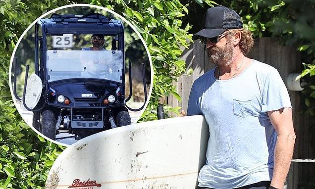 Gerard Butler - Gerard Butler takes a break from quarantine and heads to the beach in ATV to surf in Malibu - dailymail.co.uk - county Pacific - state California - Scotland - county Ocean - city Malibu