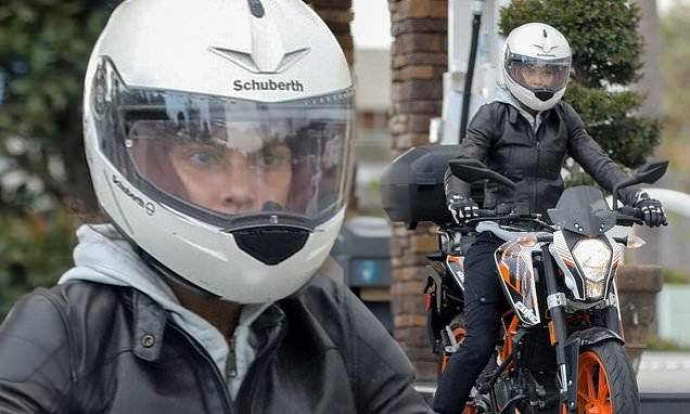 Halle Berry - Halle Berry goes hell for leather in biker jacket as she takes Duke motorbike for a spin in Malibu - dailymail.co.uk - Los Angeles - city Los Angeles - city Malibu