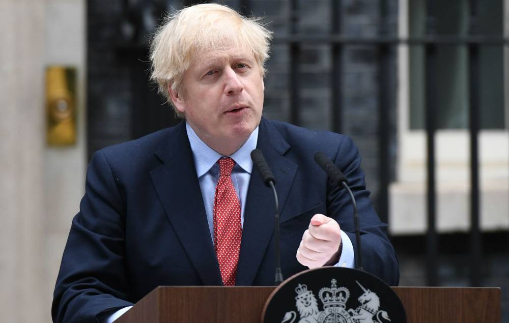 Boris Johnson - Boris Johnson warns UK lockdown must continue as he returns to work - nme.com - Britain