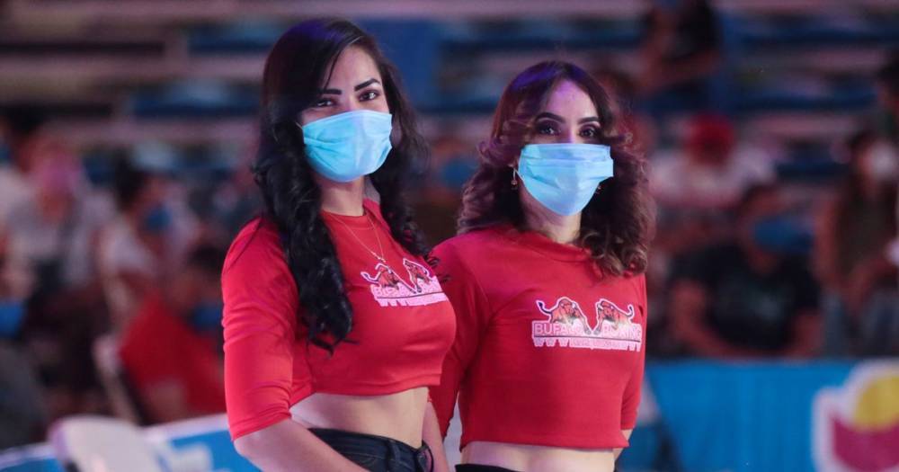 Ring girls wear masks and fighters are doused in disinfectant as boxing returns - dailystar.co.uk - county Centre - Nicaragua