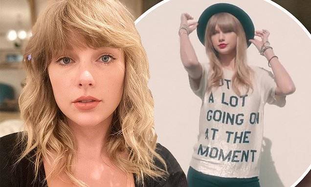 Taylor Swift makes a cheeky reference to her 22 music video with doe-eyed quarantine selfie - dailymail.co.uk