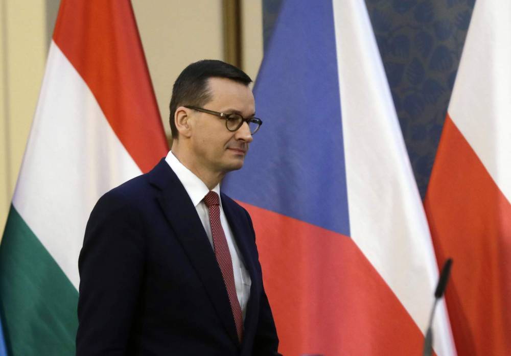 Andrzej Duda - Mateusz Morawiecki - Polish leader insists on May vote, even if delayed slightly - clickorlando.com - Poland - city Warsaw