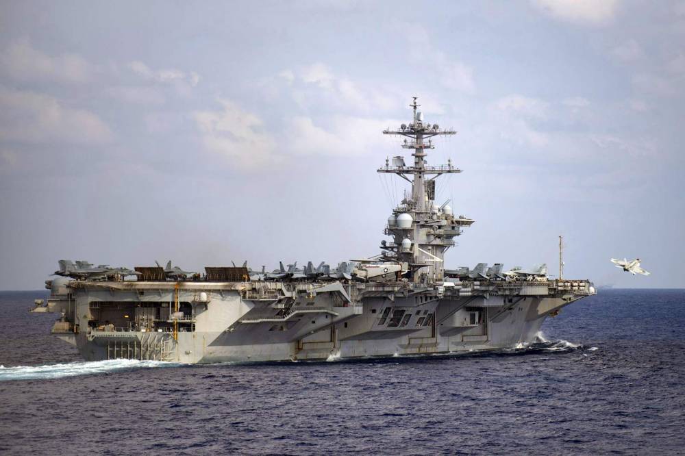Theodore Roosevelt - Navy to widen carrier probe, delaying decision on commander - clickorlando.com - county Pacific - Washington