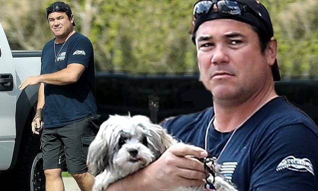 Superman actor Dean Cain, 53, cradles pooch as he steps out for CVS run amid lockdown - dailymail.co.uk - Los Angeles - city Los Angeles