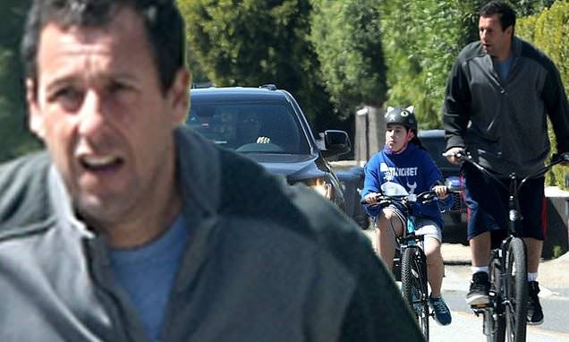 Adam Sandler - Adam Sandler takes bike ride in Malibu with daughter to get fresh air during coronavirus lockdown - dailymail.co.uk - state California - city Malibu - city Sandler