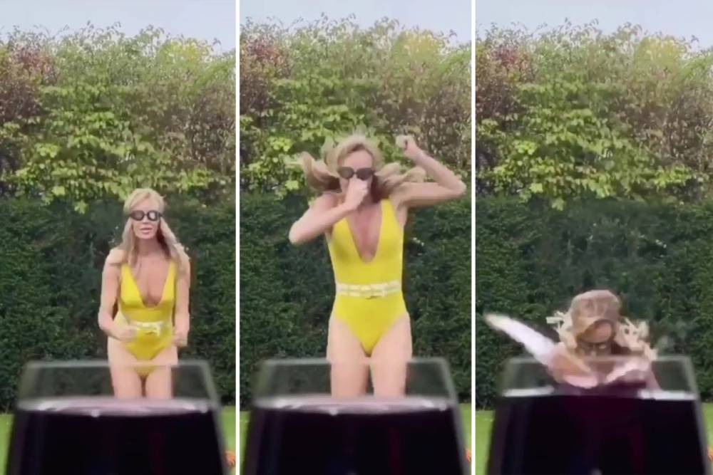 Amanda Holden - Amanda Holden dives into a giant glass of wine wearing a plunging swimsuit in mind-bending optical illusion - thesun.co.uk