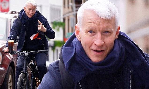 Chris Cuomo - Anderson Cooper goes maskless on a bike ride in the city, as number of New York's spikes to 102,863 - dailymail.co.uk - New York - city New York - county Anderson - county Cooper