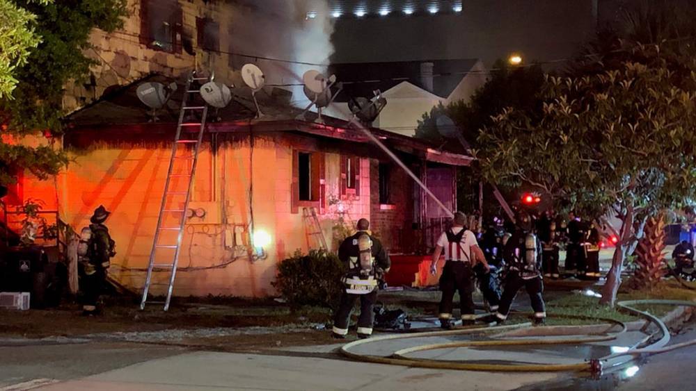 Crews putting out fire at house near Amway Center - clickorlando.com - city Orlando