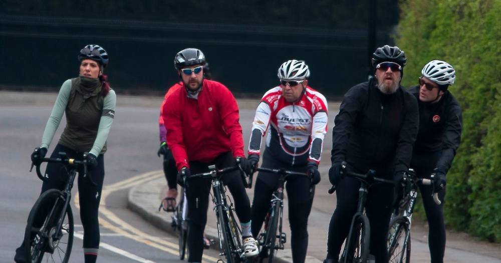 Ruth May - Cyclists ignore UK coronavirus lockdown rules as they ride together in the sun - mirror.co.uk - Britain