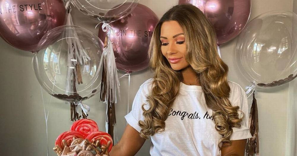 Winter Love-Island - Shaughna Phillips celebrates InTheStyle isolation launch with cake and balloons - mirror.co.uk - Britain