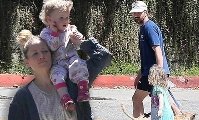 Erika Christensen carries one-year-old daughter on her shoulders, while out with husband in LA - dailymail.co.uk - Los Angeles - state California