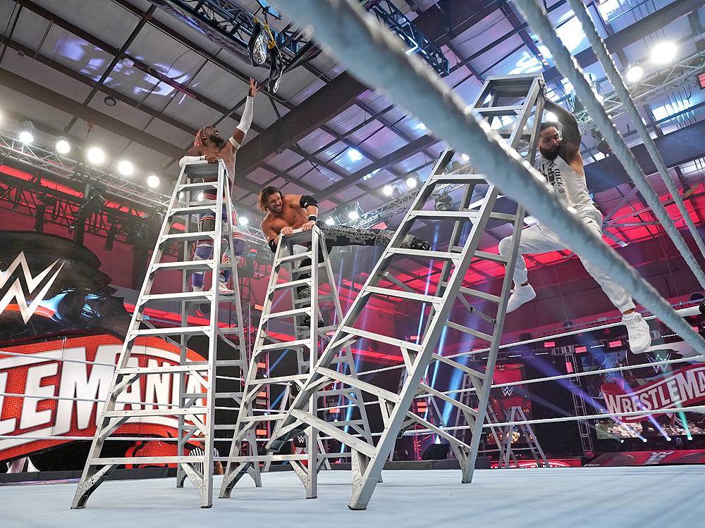 WRESTLEMANIA: No fans, no problem ... WWE delivers with title changes on Night 1 - torontosun.com - New York - city Tampa
