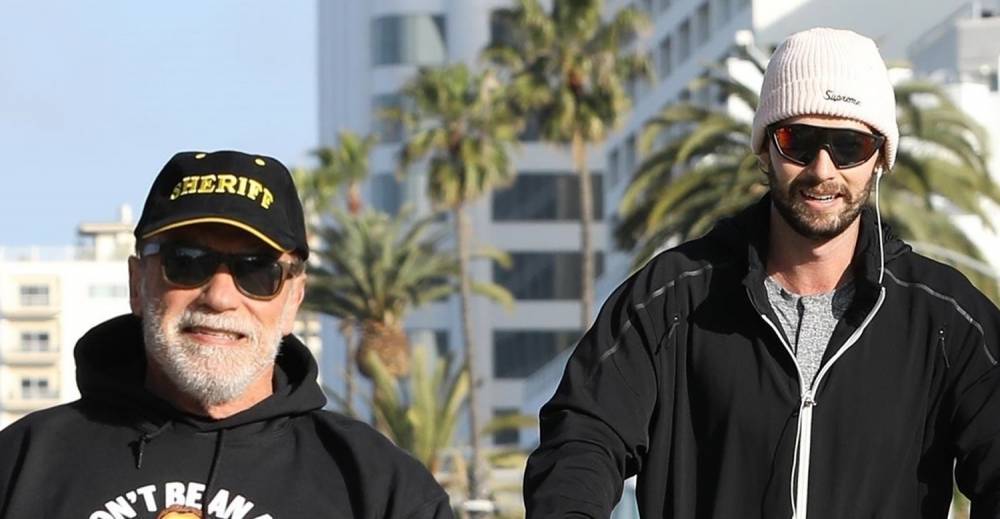 Arnold Schwarzenegger - Patrick Schwarzenegger - Arnold Schwarzenegger Reminds Us to Stay Inside With Funny Hoodie - justjared.com - state California - city Santa Monica