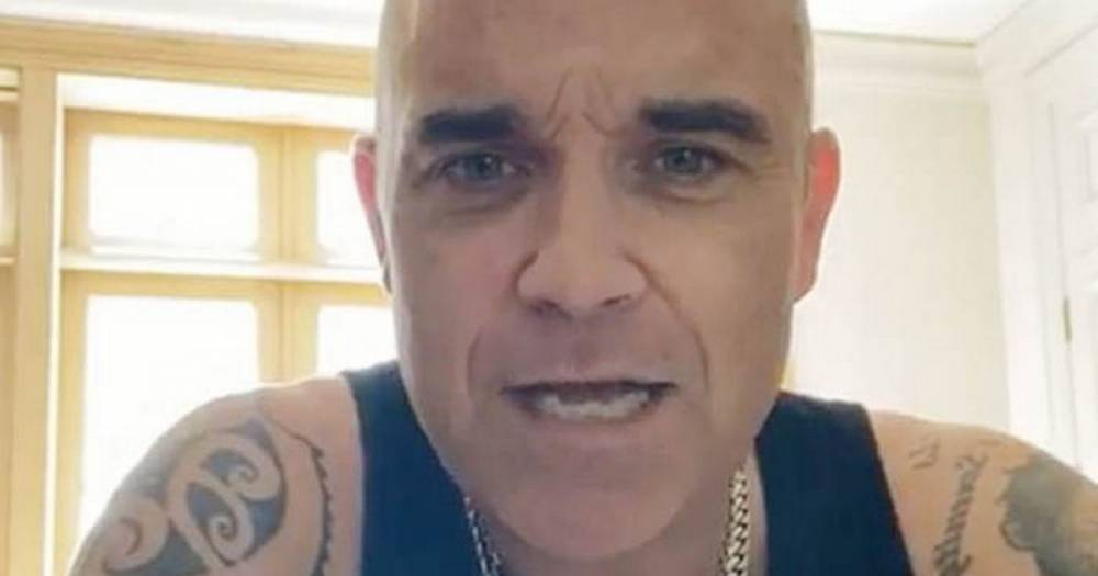 Robbie Williams - Robbie Williams moved into Airbnb away from family as he battled coronavirus symptoms - mirror.co.uk - Los Angeles