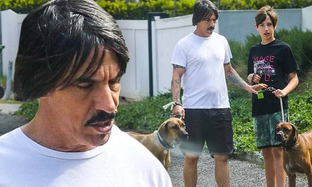 Anthony Kiedis gets some fresh air with son Everly while walking his dogs in Malibu - dailymail.co.uk - city Malibu