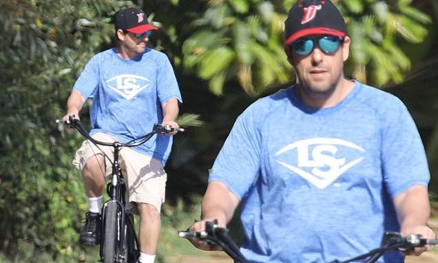 Adam Sandler - Adam Sandler looks cool in reflective shades on bicycle ride in Malibu during coronavirus lockdown - dailymail.co.uk - state California - city Malibu - city Sandler