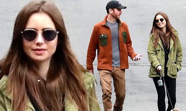 Charlie Macdowell - Phil Collins - Lily Collins - Lily Collins is stylish in green jacket and black leggings as she walks dog with Charlie McDowell - dailymail.co.uk - Britain - state California - county Collin - county Mcdowell