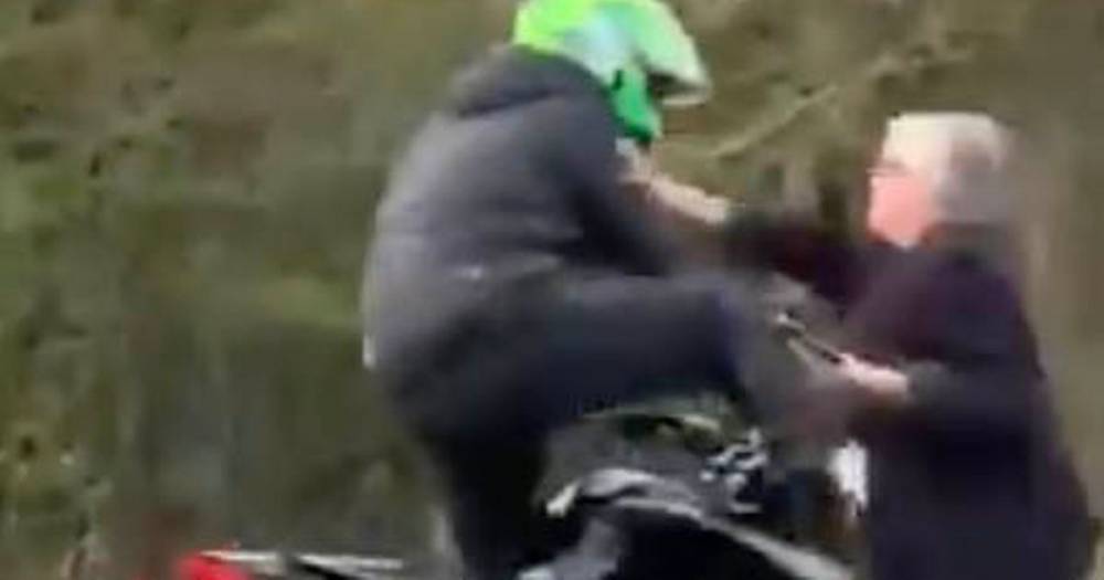 West Yorkshire - Biker kicks woman to the ground on golf course before driving off in appalling clip - dailystar.co.uk