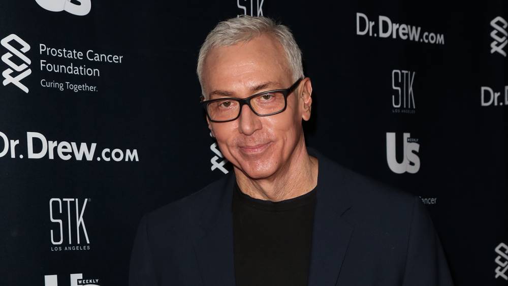 Donald Trump - Drew Pinsky - Caught in Video Mashup, Dr. Drew Apologizes for Virus Comments - hollywoodreporter.com - Washington