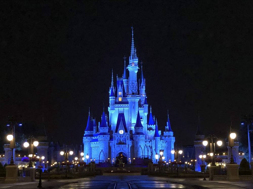 Cinderella’s Castle shines in blue as Disney parks thank health care workers - clickorlando.com