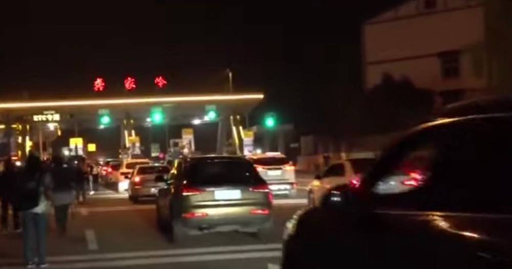 Wuhan ends 76-day coronavirus lockdown leading to car queues for miles at border - dailystar.co.uk - China - city Wuhan - province Hubei - province Hunan
