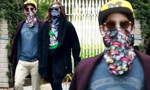 Darren Criss - Mia Swier - Darren Criss and his wife Mia Swier head out for a walk in the rain and wear bandanas as face masks - dailymail.co.uk - Los Angeles - city Los Angeles