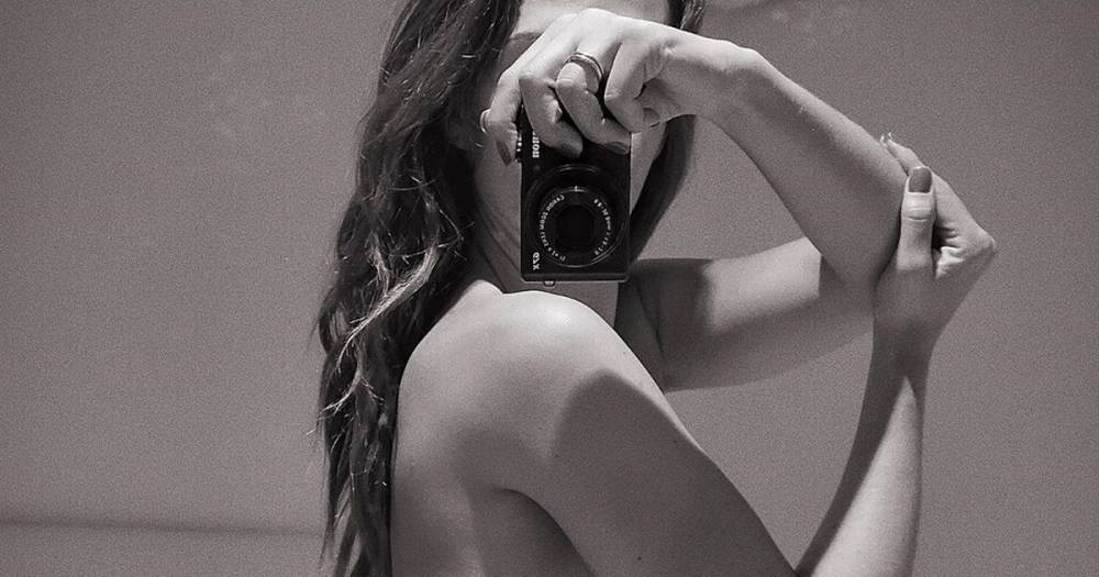 Ex-Real Madrid star's wife soothes quarantine boredom by sharing naked bedroom snap - dailystar.co.uk - Spain - city Madrid, county Real - county Real