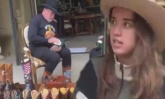 Arnold Schwarzenegger - Arnold Schwarzenegger puts daughter to work polishing his huge cowboy boot collection - dailymail.co.uk - state California