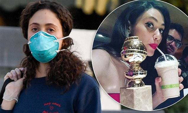 Emmy Rossum - Emmy Rossum covers up in a surgical face mask and thin gloves while out after posting a throwback - dailymail.co.uk - Los Angeles - city Los Angeles